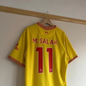 Yellow Soccer Jersey with Red Accents